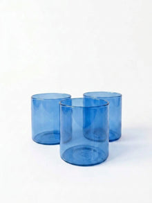 Dark blue glass tumbler