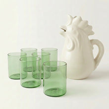 Six green glass tumblers with rooster pitcher